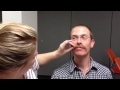 Katie waxes Bryan's Movember mo