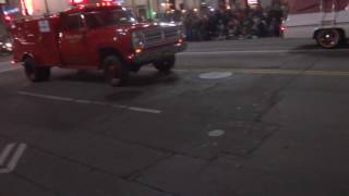 Ghostbusters car and old lacofd squad 51 from tv show in Hollywood Christmas parade