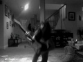 Elly playin guitar on Rock Band 2