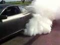 Satin Black Twin Turbo Toyota Supra Burnout - Tire Blowout