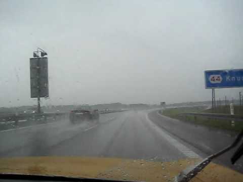 Alfa Romeo 1750 GT Veloce 1968 forcing heavy rain