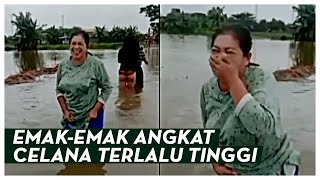 VIRAL  Emak-emak Angkat Celana Saat Banjir, Netizen: Bu, Itunya Kelihatan!