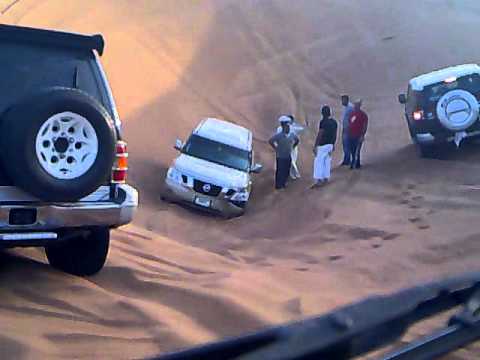 Nissan patrol 2010 stuck in sand at the desert