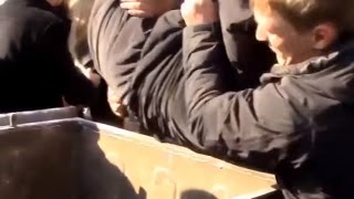 Euromaidan - Corrupt Ukrainian Official Is Thrown Into The Garbage Can