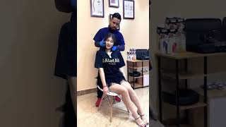 Hot Asian girl doing chiropractic