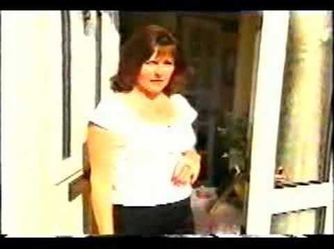 female leg amputee walking on crutches