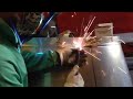 MIG welding on thin stainless steel sheet metal.