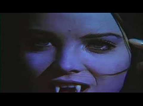 Vampire girl tries to bite man