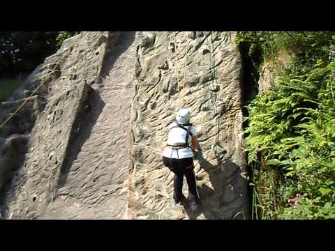 Kym rock climbing