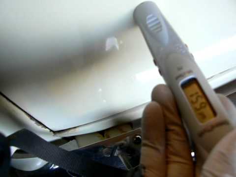 Measuring Paint Thickness on 1959 Mercedes 220S Sedan For Sale at CarPlanet 