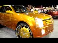 AceWhips.NET- Gold Cadillac SRX on 28" Rockstars