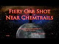 Fiery Orb (UFO) Filmed With A Telescope Near Chemtrails