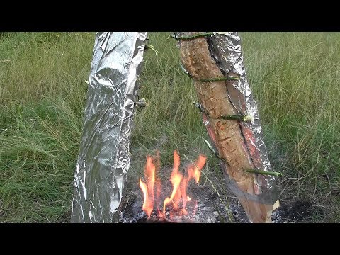 Рыба на костре. Амур запеченный на досках Рыба на костре. Амур запеченный на досках