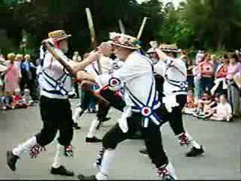 The Essex based'Cotswold' morris side give their sticks a wave at the South