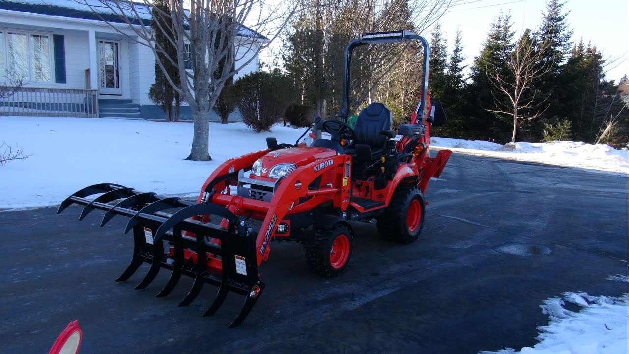 Land Pride Grapple and the Kubota BX25 D YouTube