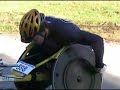 Title:David Swope climbs in Marine Corps Marathon Description:Swope ascends the final, steep climb to the Iwo Jima Memorial to win the wheelchair division of the 2007 Marine Corps Marathon.