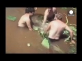 Sinkhole superstar: Boy sucked into storm drain reemerges 6m away, Brazil