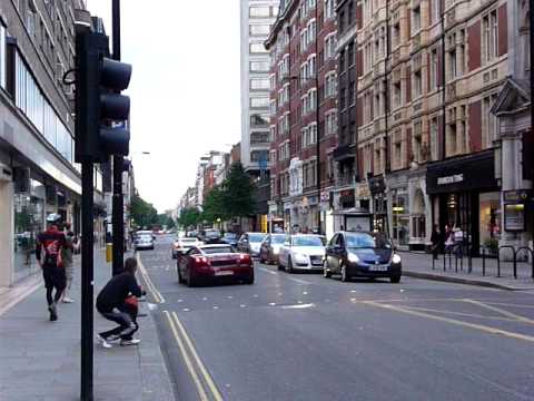 2 LOUD Lamborghini Gallardos accelerating on Sloane Street
