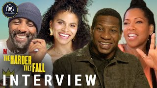 The Harder They Fall Interviews Idris Elba, Jonathan Majors, Regina King & More