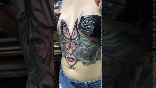 Done for now on this Roses and butterfly morph girl torso tattoo by Gary Dressler