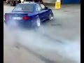 Sexy classic BMW E30 doing a burn out