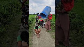 The Woman Covered The Boy With A Drum.