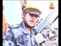 Chinees rescue team trying to pull out man uder debris in earthquake hit Nepal