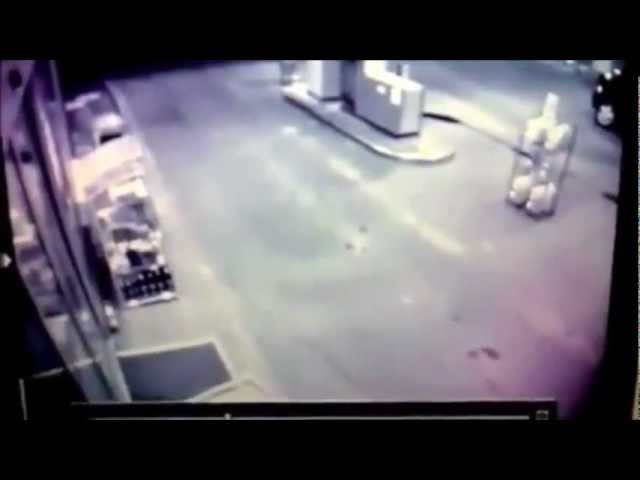 Guy Runs Straight Into Gas Station Glass Door - Video