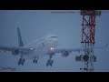 SAS (Star Alliance) / Airbus A340-300 Landing in heavy Snow (1 minute. Just plain spotting)