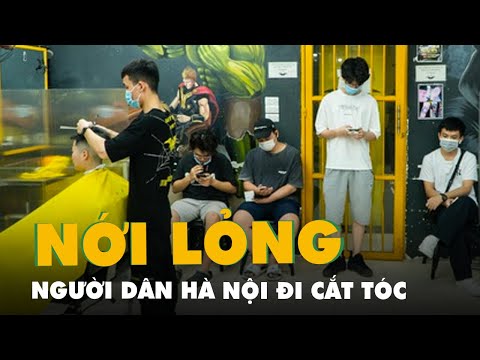 Người Hà Nội xếp hàng đợi cắt tóc trong ngày đầu nới lỏng