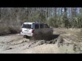 Jeep Commander Overland and 4Runner going through mud