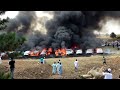 Burning Cars, Ijtima 2013 Mia's Farm, Waterfall Park, Woodmead, South Africa....cigarette butt?