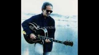 Watch JJ Cale Roll On Mama video
