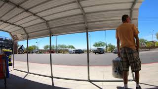 Moving Valley Metro Rural Route Bus Stop to Auto Care Center, Walmart, Buckeye, Arizona, GX057273