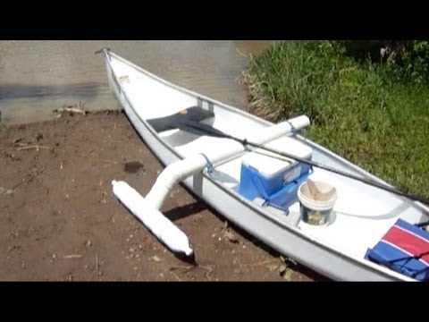 The worlds Coolest $100 Catfishing Canoe with homemade outrigger Canoe 