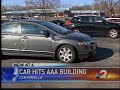 Car hits AAA building