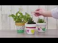 Decorate a clay pot step-by-step with Derwent