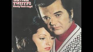 Watch Conway Twitty Somewhere Just Out Of Her Mind video