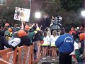 Erin Andrews borrows an Oregon cheerleader's pom poms 12-04-2010