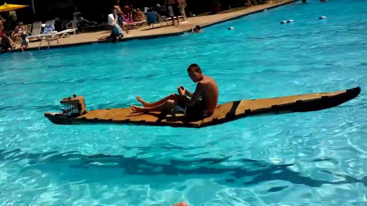 Ethan on cardboard paddleboard at Wellington 2012 Cardboard Boat 