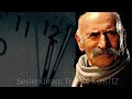 Saat On İkiyi Beş Geçiyordu Şiiri Tuncel KURTİZ klip izle