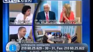 Greek Neo-Nazi Golden Dawn MP slaps a left-wing politician in the face on live television.