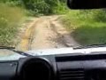 Land Rover TD4 Defender 110 Pick Up Going through a Trail
