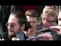 Tokio Hotel signing autographs at their hotel in Paris