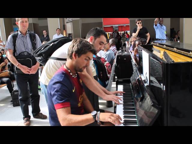 Two Strangers Play The Piano Together At Paris Train Station - Video