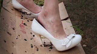 High Heels Cardboard Crush, High Heels Sinking In Cardboard, High Heels Sinking In Ground