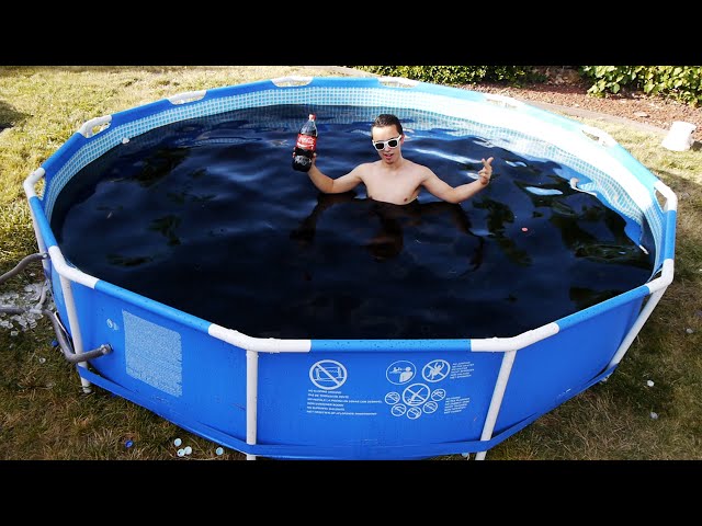Swimming In Giant 1,500 Gallon Coca-Cola Swimming Pool - Video