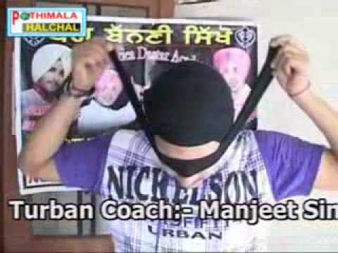 Turban Coach Manjeet Singh Ferozpuria tying turban with closed...