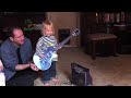 20101222 - Playing Mama's Guitar