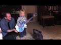20101222 - Playing Mama's Guitar